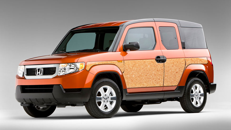 Illustration for article titled How Ten Modern Cars Would Look With Wood Panelling